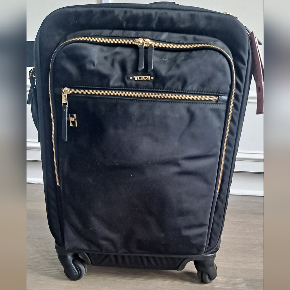 Tumi spinner carry-on bag